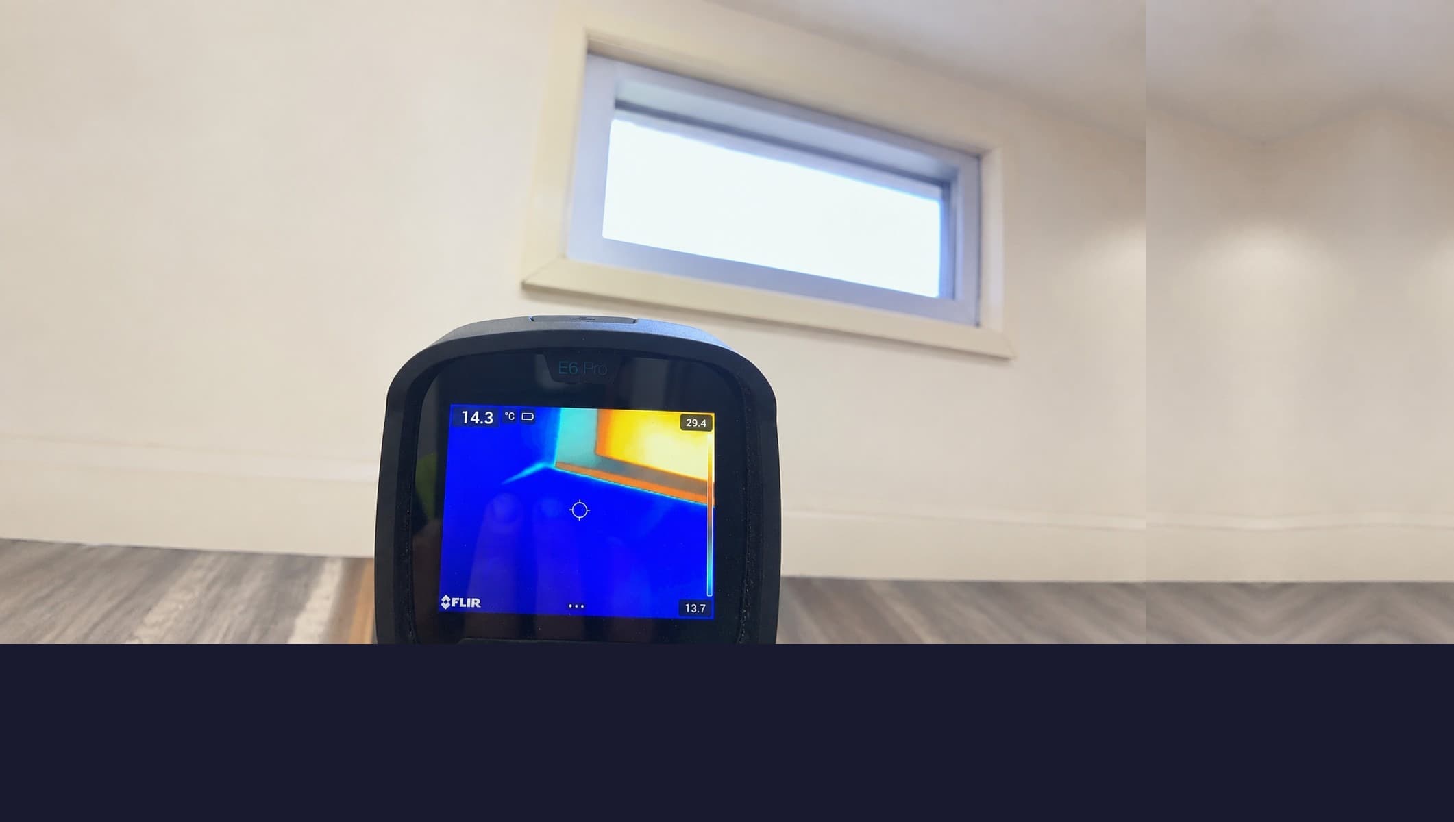 Thermal imaging camera reading a temperature variance near a window